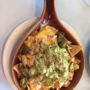Chicken nachos with guacamole! My favorite thing to eat here only $8.94($2.99 if you add guacamole)they make everything fresh!