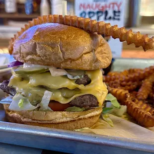 a cheeseburger and fries