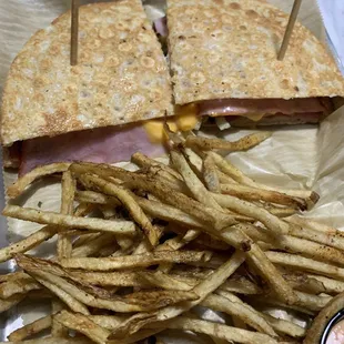 One slice turkey, 2 slices ham and fake american cheese. Club and fries