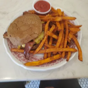 a plate of fries and a sandwich