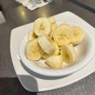 a plate of sliced bananas