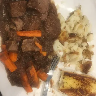 Slow cooked pot roast with homemade gravy.