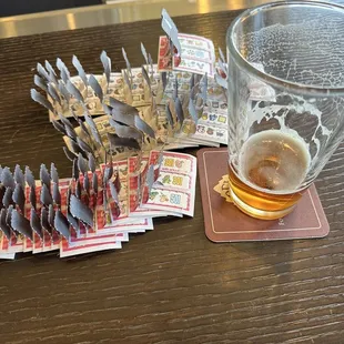 a pint of beer and spoons