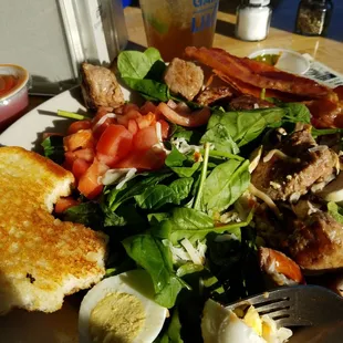 Spinach Salad with steak bites,  rare!!! Awesome and delicious!  Try it!