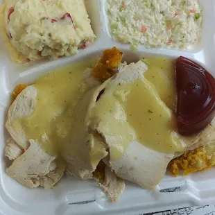 Turkey and dressing with potato and Cole slaw