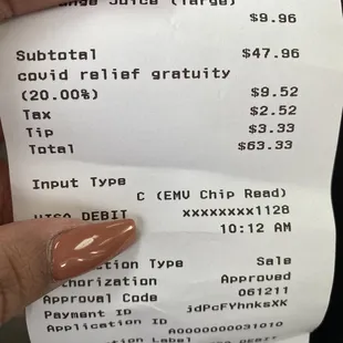 a person holding a receipt