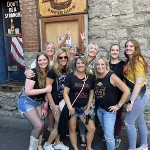 a group of women posing for a picture