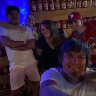 a group of people in a bar