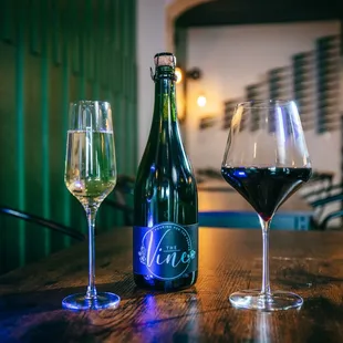 a bottle of wine and two glasses of wine