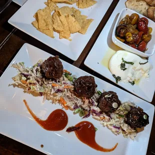 three plates of food on a table