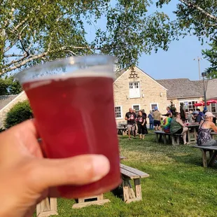 a person holding a glass of wine