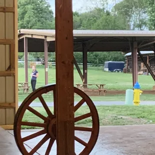 a wagon wheel in the barn