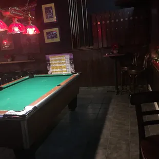 a pool table in a bar