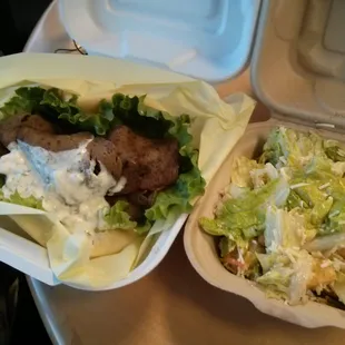 Gyro beef with mushy Caesar salard.
