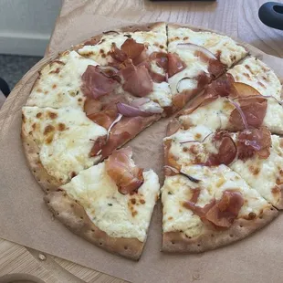 Hot honey and prosciutto pizza