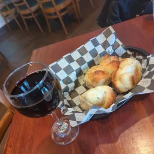 Garlic knots with a Malbec