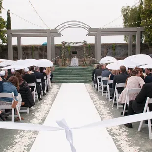 Umbrellas handed to all the guests when it started to drizzle