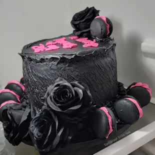 a black and pink cake