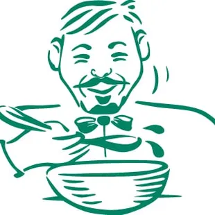 a man eating a bowl of soup