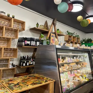 a display of wine and cheeses