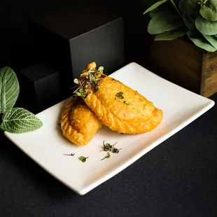 Empanada Appetizer - our empanadas change every week, ask your sever for the flavor of the week!