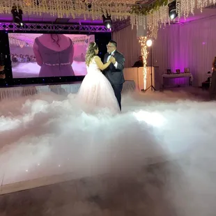 Father and daughter dance.