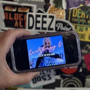 a person holding a cell phone