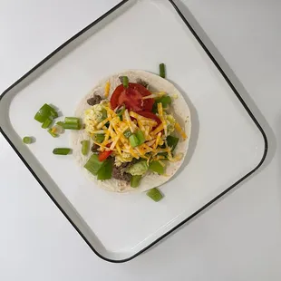 Mexican deconstructed egg and sausage tortilla