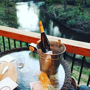 Enjoy a bottle or a glass of wine on our patio!