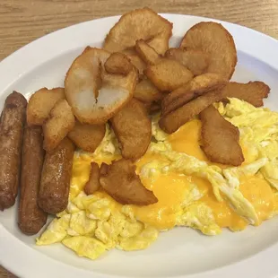 Eggs Any Style (Three Eggs) - scrambled eggs with cheese, turkey sausage, and home fries cooked with well done