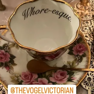 a cup and saucer on a table