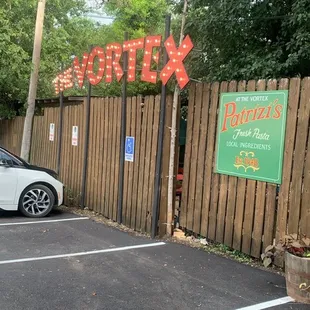 a white car parked in a parking lot