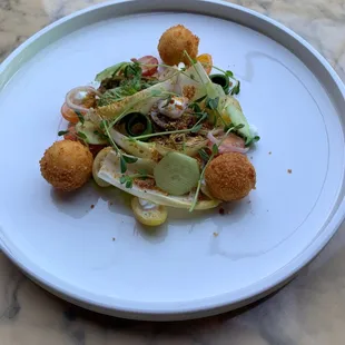 Chefs special Belgian Endive Salad heirloom tomatoes, Greek yogurt, goat cheese croquettes and balsamic vinaigrette.