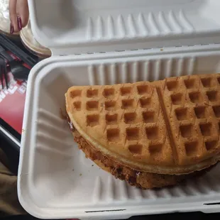 Original chicken and waffles sandwich with honey butter.