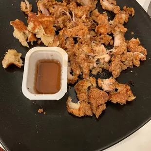What is left from trying to find the chicken. There was very little to be eaten. All of this is dried hard breading