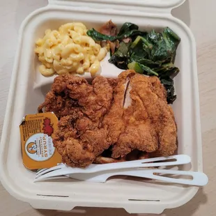a meal in a styrofoam container