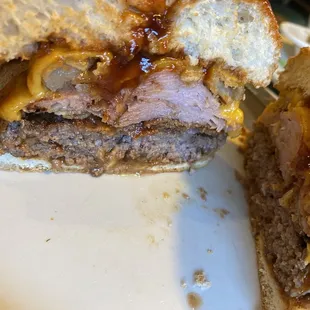Cowboy burger cut in half.