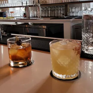 two cocktails on the bar