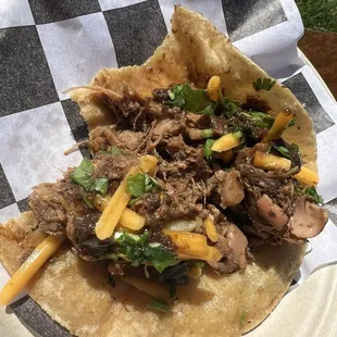 Spicy jerk jackfruit taco. It was so delicious I couldn't wait to take a pic before I took a bite ‍.