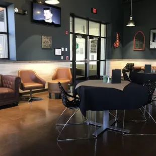 I think this is a nice set-up for hanging around, maybe when waiting for seating.  Comfortable &quot;airy&quot; and spacious setting.
