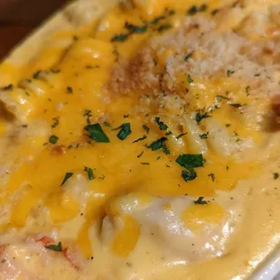 a plate of pasta with cheese