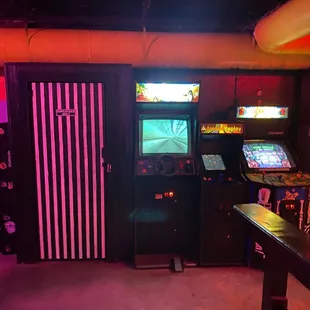 a game room with arcade machines