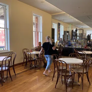 Dining area inside, but patio tables outside too.