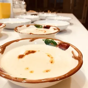 Curried Cauliflower Soup, toasted pistachios, chili oil