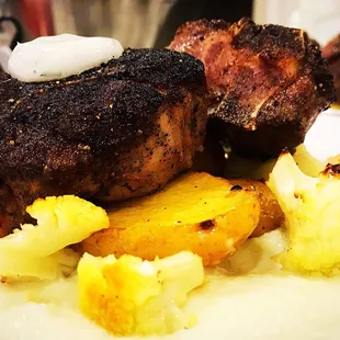 Middle eastern lamb chops, fingerling confit l, roasted and puréed cauliflower and dill yogurt