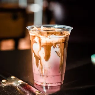 a cold drink with ice cream and caramel