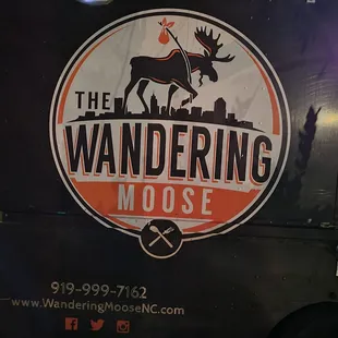 a moose on the side of a truck