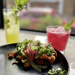 a plate of food and a drink