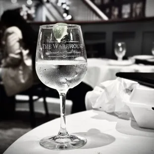 a glass of water on a table