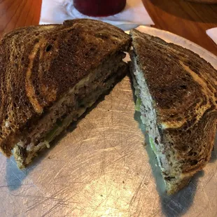 a grilled sandwich cut in half